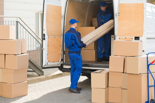 Professional removal team preparing a move in a Belgravia townhouse