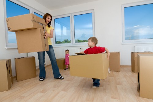 Careful furniture moving in a Belgravia apartment with narrow access