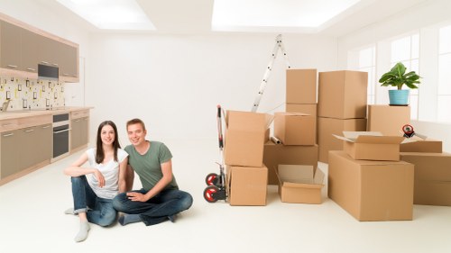 Moving van and organised household items ready for a Belgravia relocation
