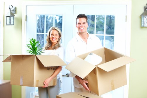 Removal team loading belongings for a central London home move