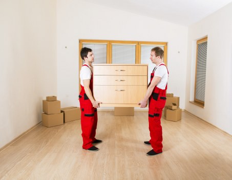 Packed moving boxes and wrapped furniture prepared for a Belgravia house move